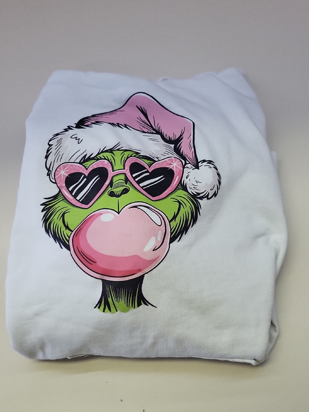 White Graphic Sweatshirt with Pink Santa Grinch